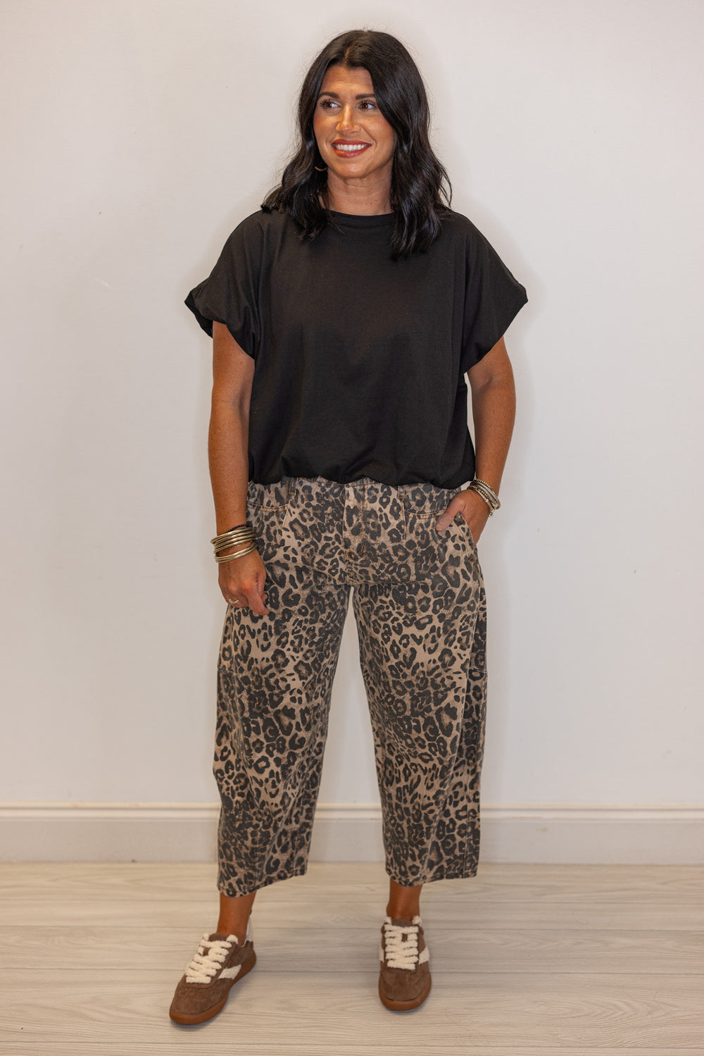 Black knit semi-cropped top with bubble hem by Wishlist showing full front view