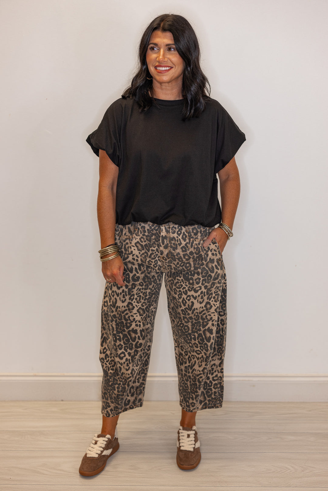 Black knit semi-cropped top with bubble hem by Wishlist showing full front view