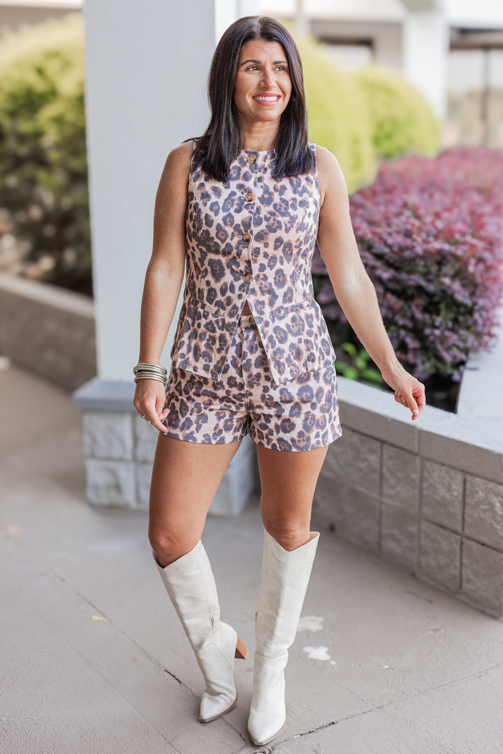 Women's black, brown and tan leopard print button front denim vest by Karlie showing full front view