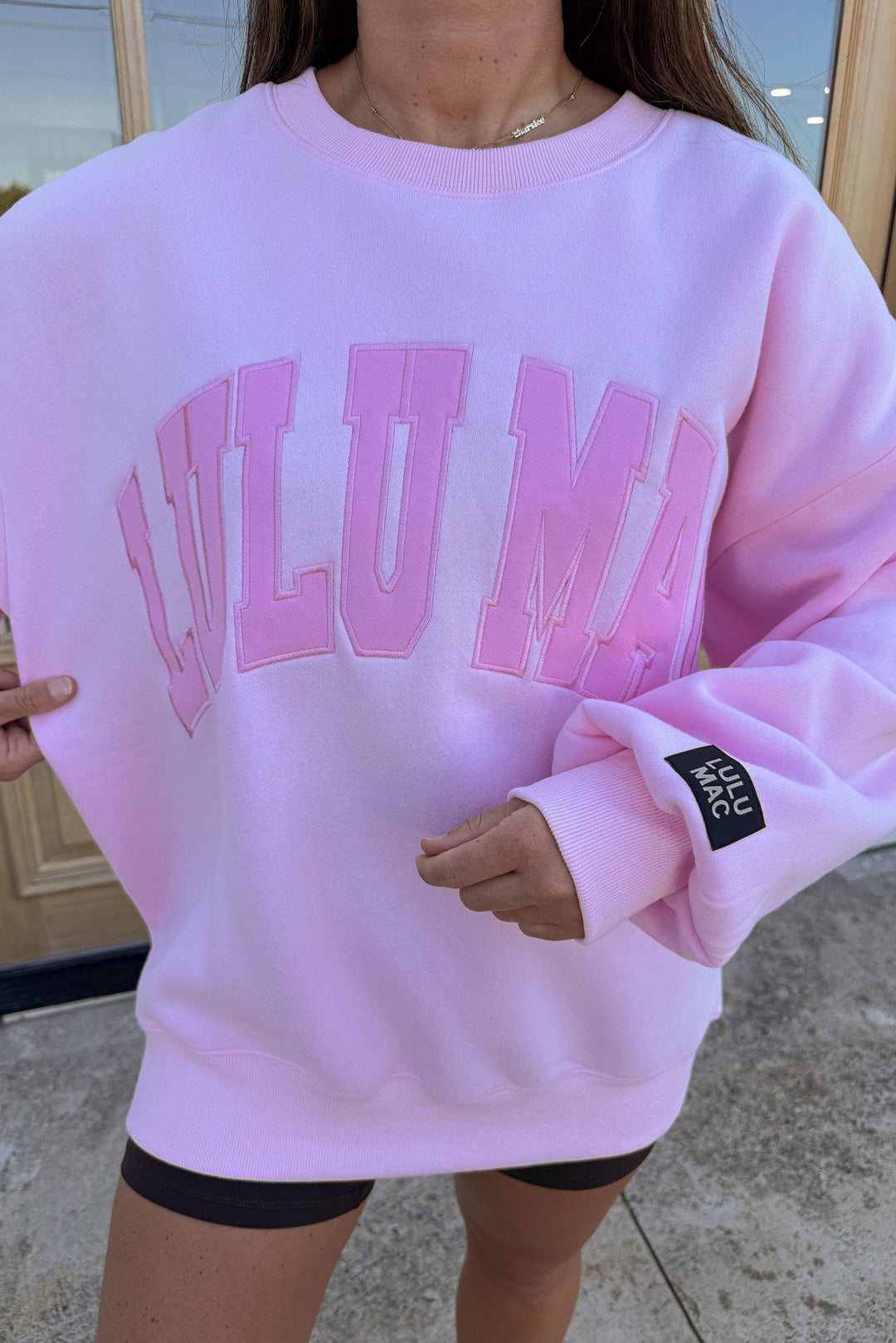 solid light pink combo embroidered lulu mac crew neckline long sleeve sweatshirt