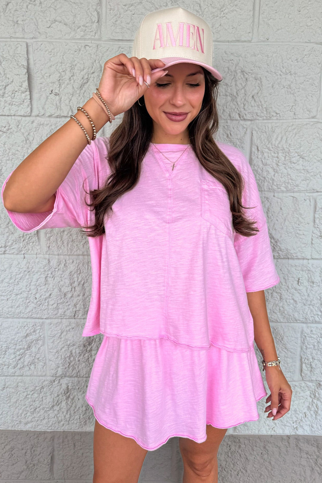 solid light pink drop shoulder short sleeve top and skort knit matching athleisure set
