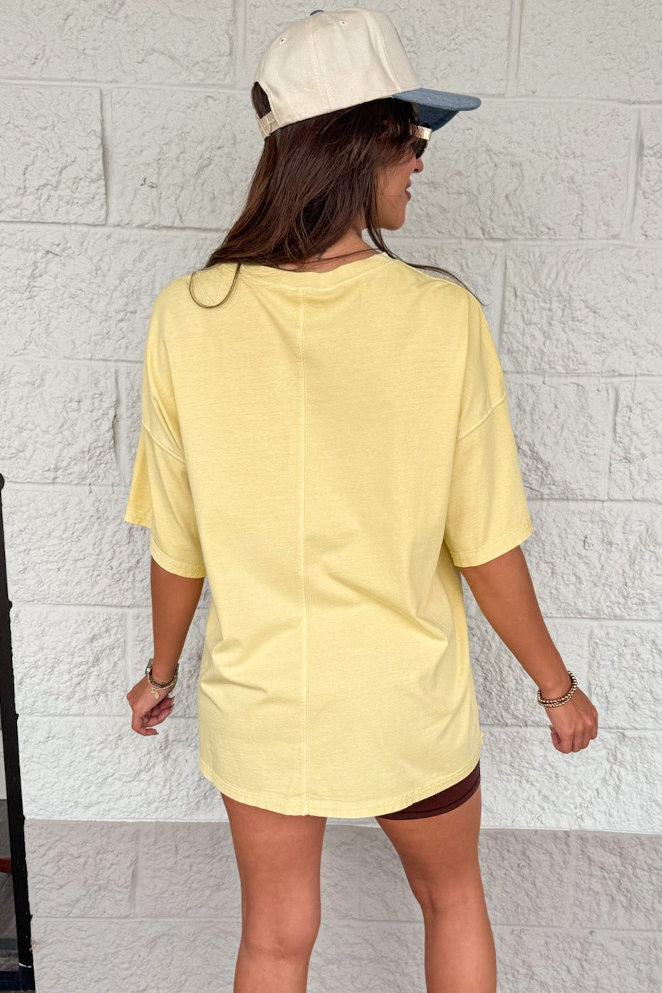 mineral washed light canary yellow reverse seam details oversized tee with missing chest pocket