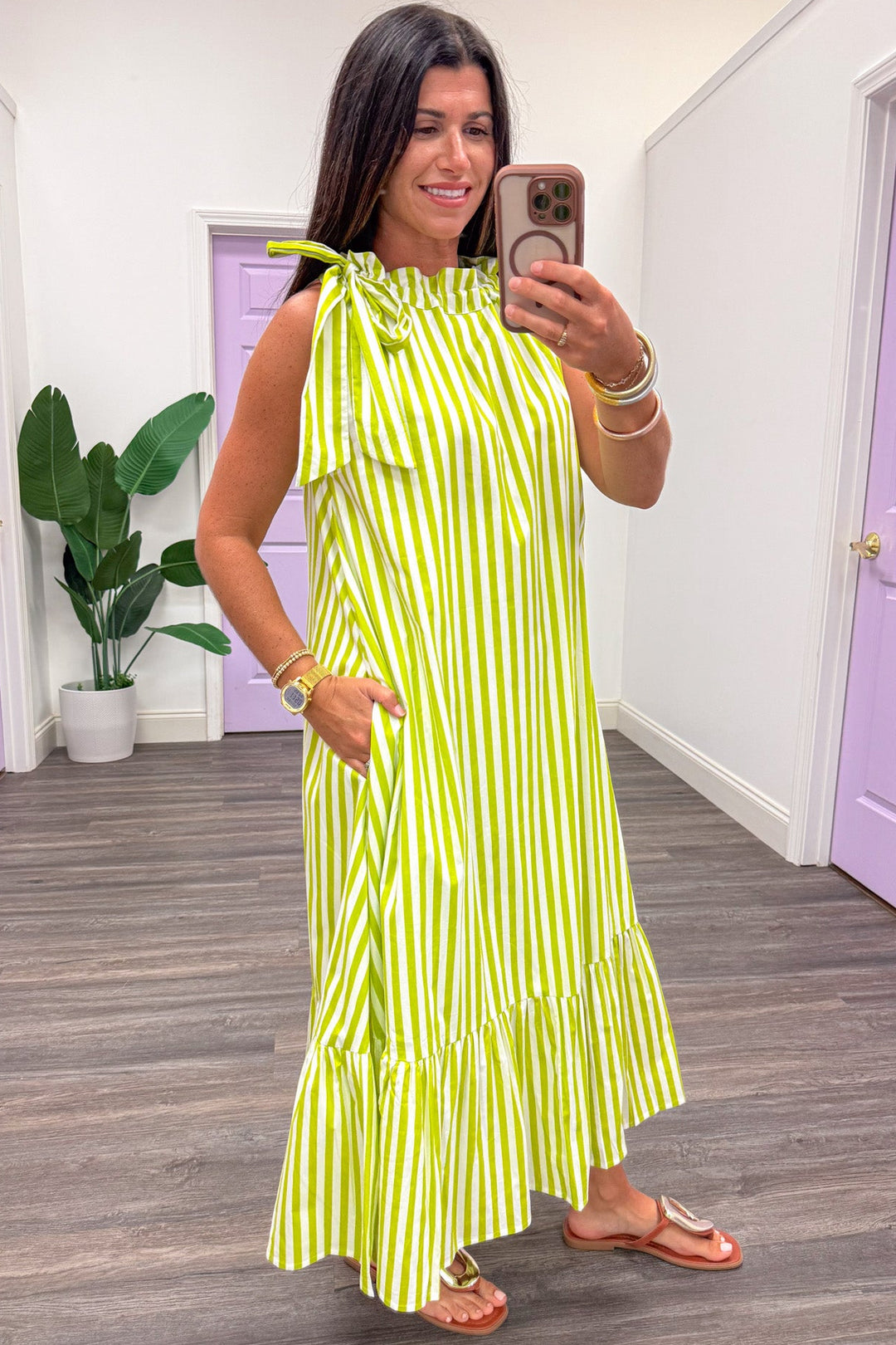 lime green and cream striped cinch mock neck sleeveless midi dress with side pockets