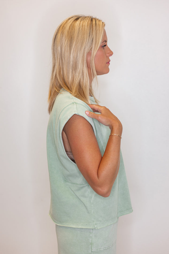 Women's mineral washed mint latte green knit sleeveless top by Rae Mode showing side view