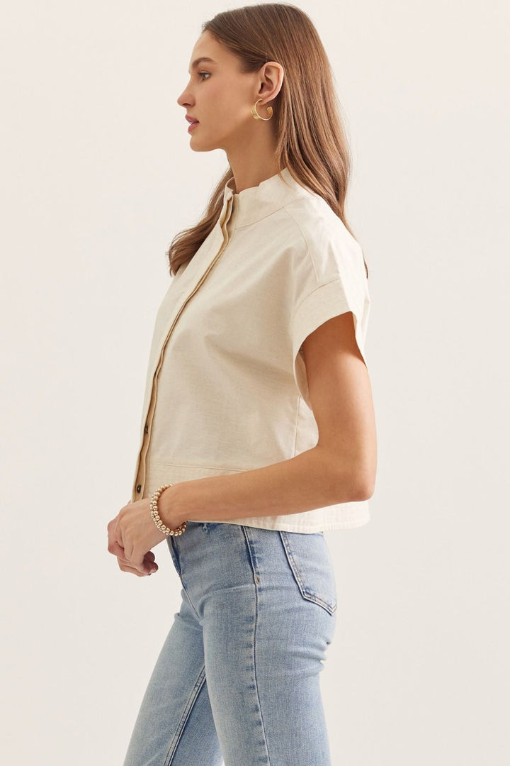 Entro natural cotton linen blend button down short sleeve top showing side silhouette