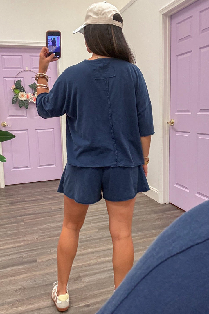 solid navy blue reverse seam details top and skort slub knit matching athleisure set
