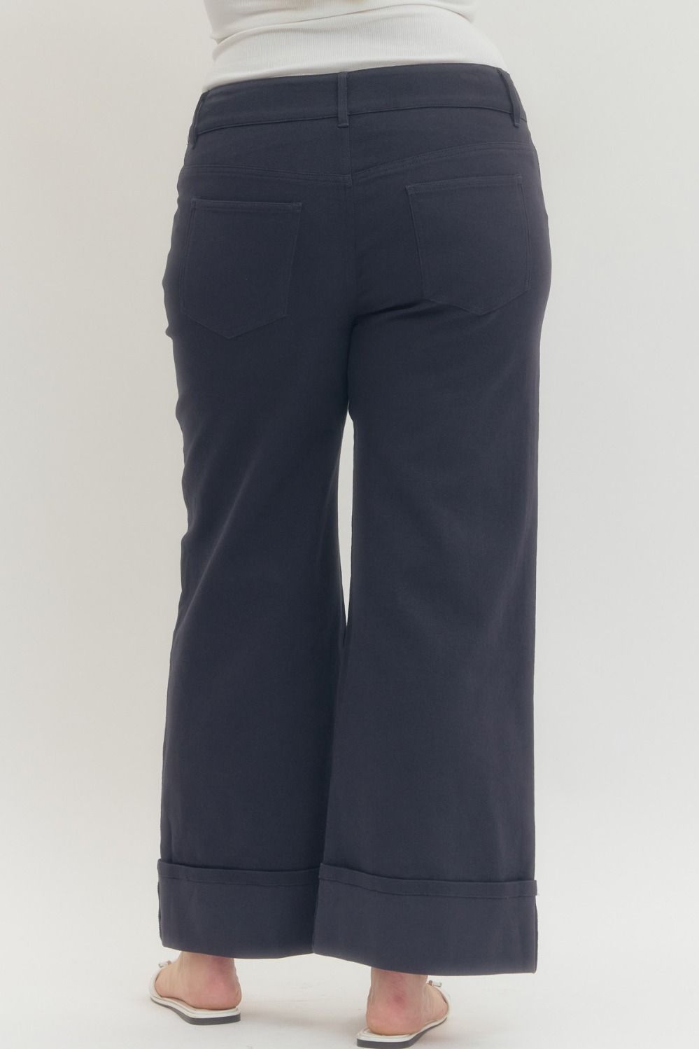 Women's navy twill denim cropped ankle pants by Entro in plus showing back view