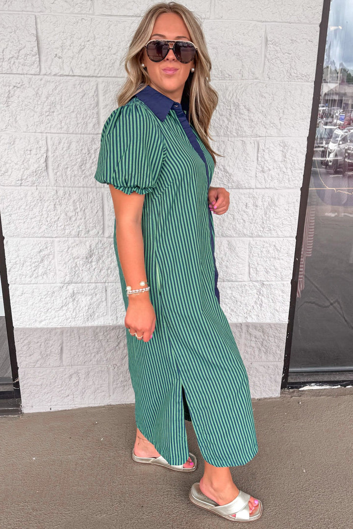 navy blue and green striped button front puff sleeve midi dress with side slits at hem