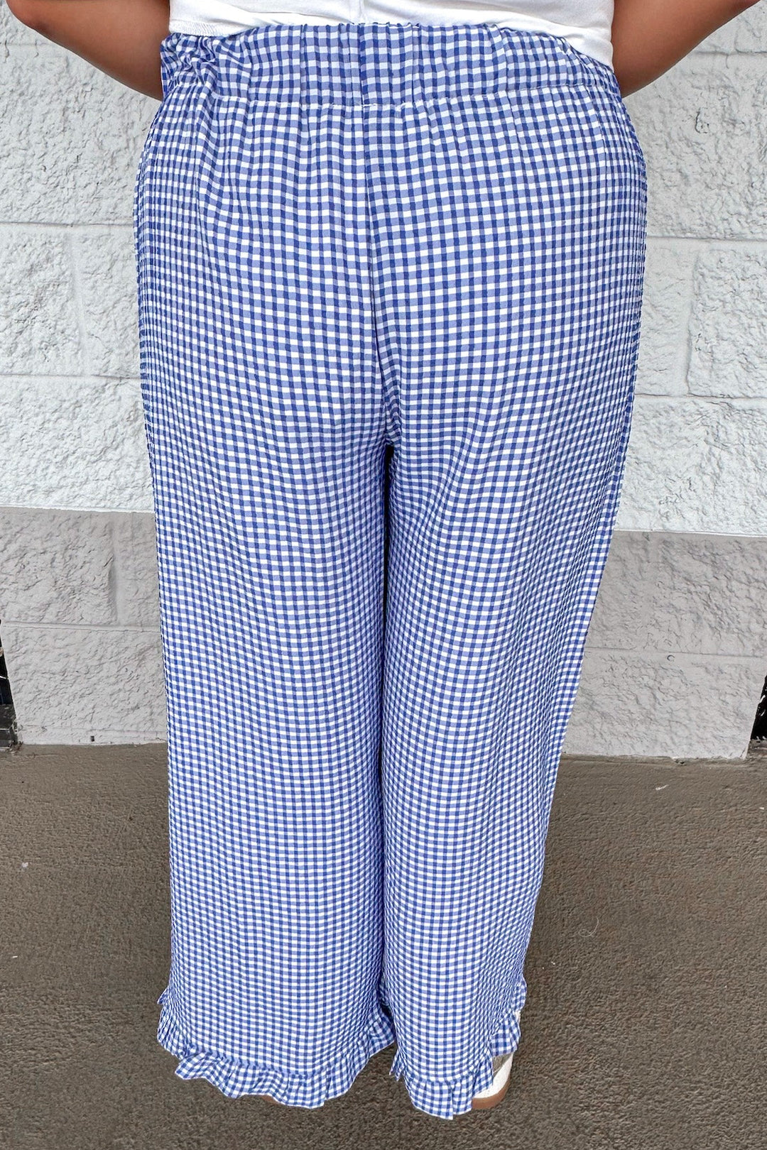 navy blue and ivory gingham checkered print ruffle hem wide leg elastic waist pants