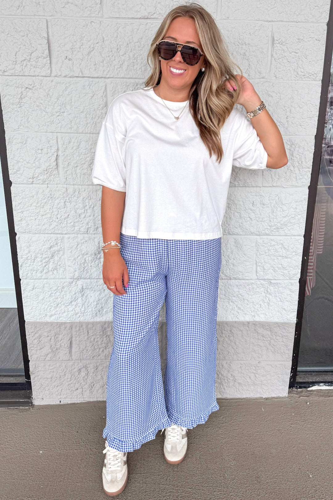 dark blue and ivory gingham checkered print ruffle hem wide leg pants