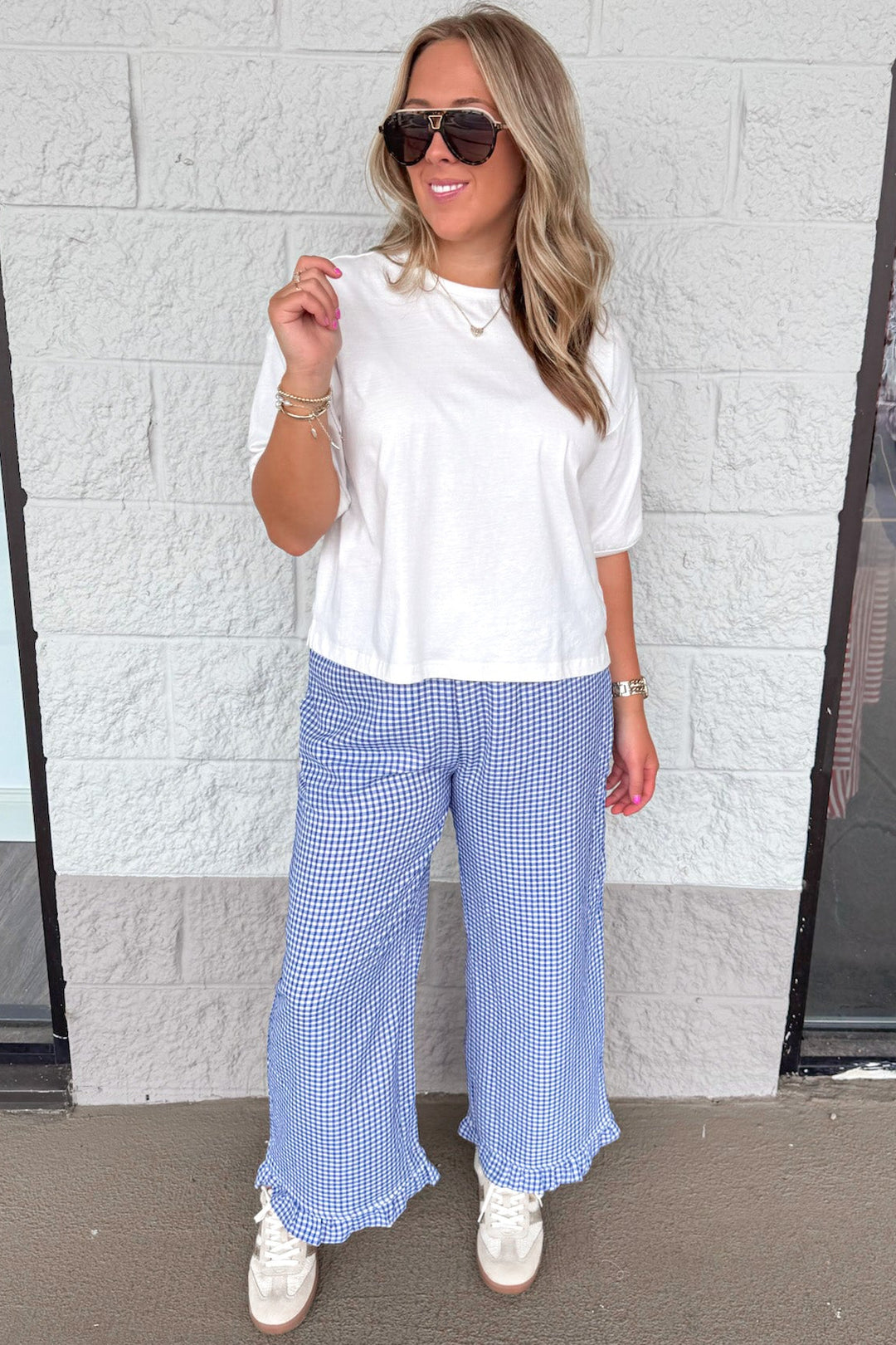 navy blue and ivory gingham checkered print ruffle hem wide leg pants