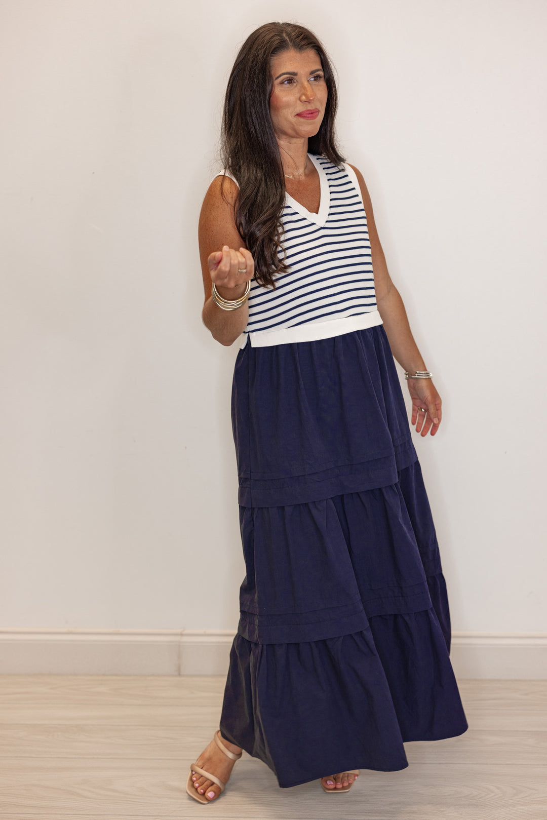 Women's navy poplin dress with sleeveless cream and navy knit striped top by Jodifl showing partial side view