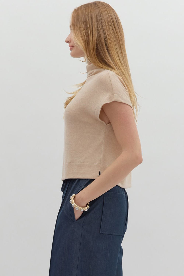 Women's oatmeal knit cropped top by Entro showing side view