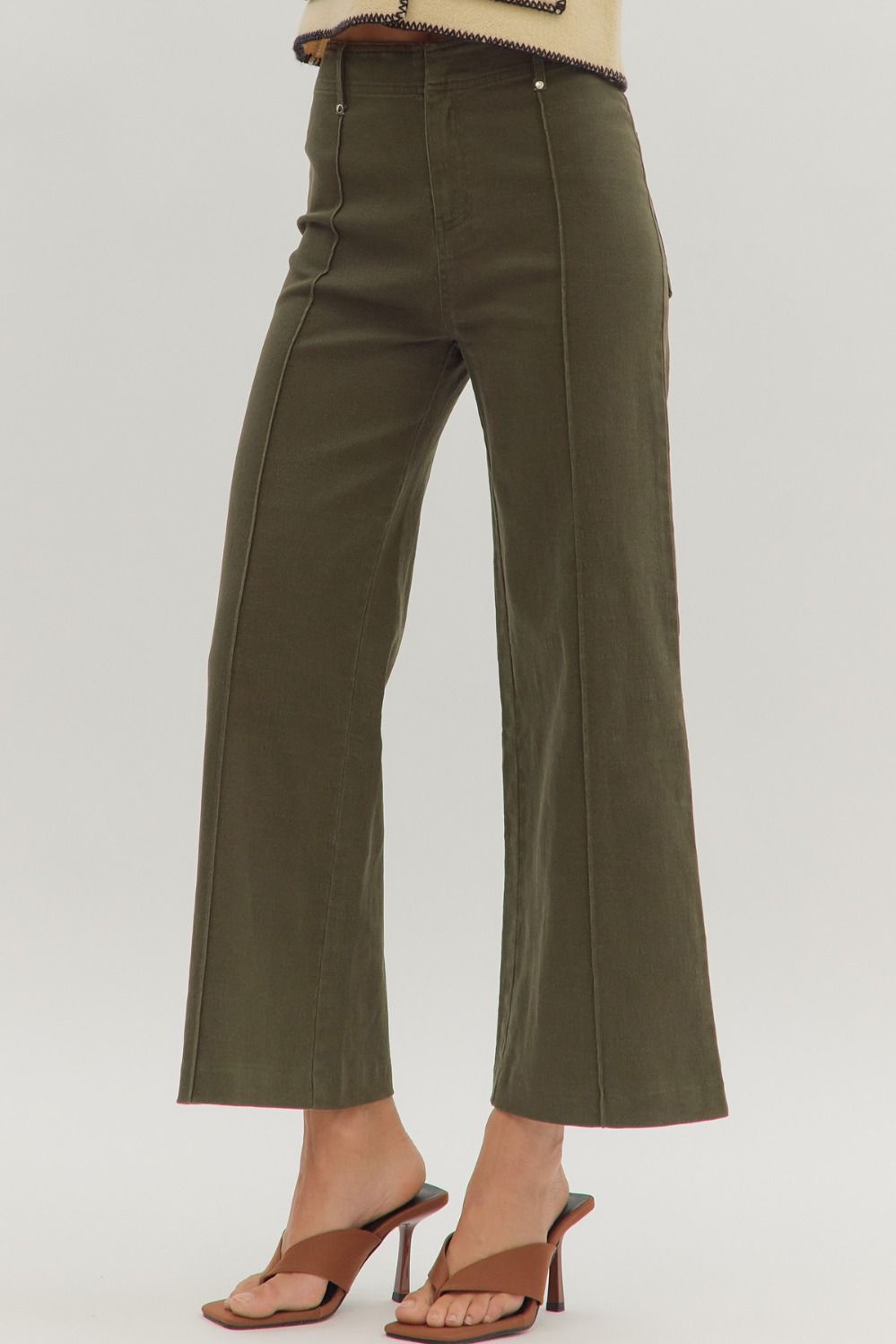 Women's olive denim cropped pants with pintuck seam detail by Entro showing slight side view