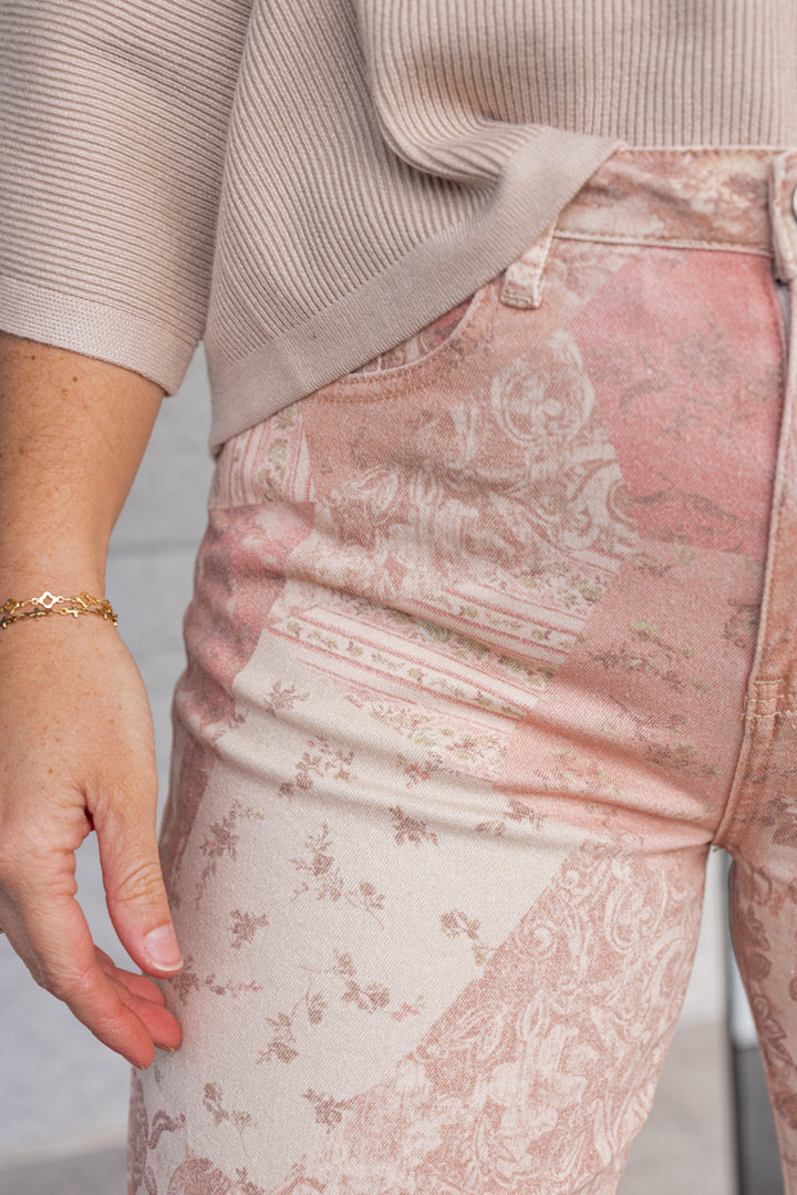 Women's vintage rose pink twill denim pants by Easel showing floral patchwork