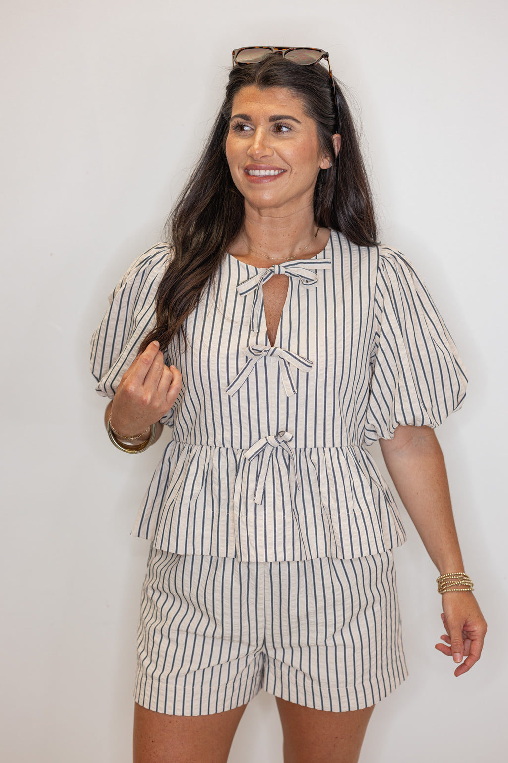 classy pin stripe bow detail peplum top