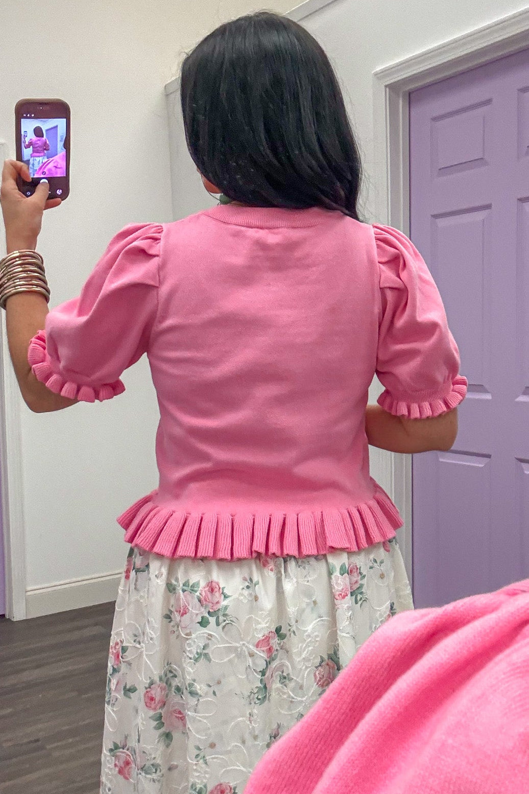 Pink ruffle pleat detail puff sleeve knit top back view