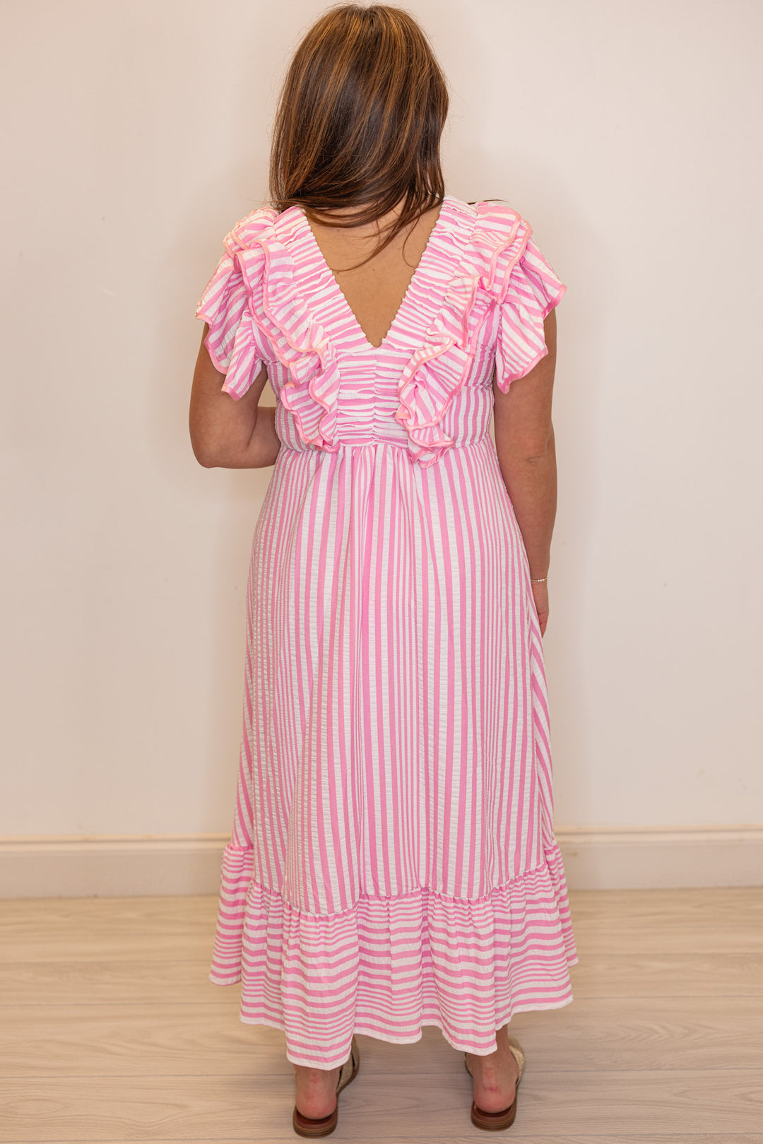 pink stripe ruffle midi dress back view