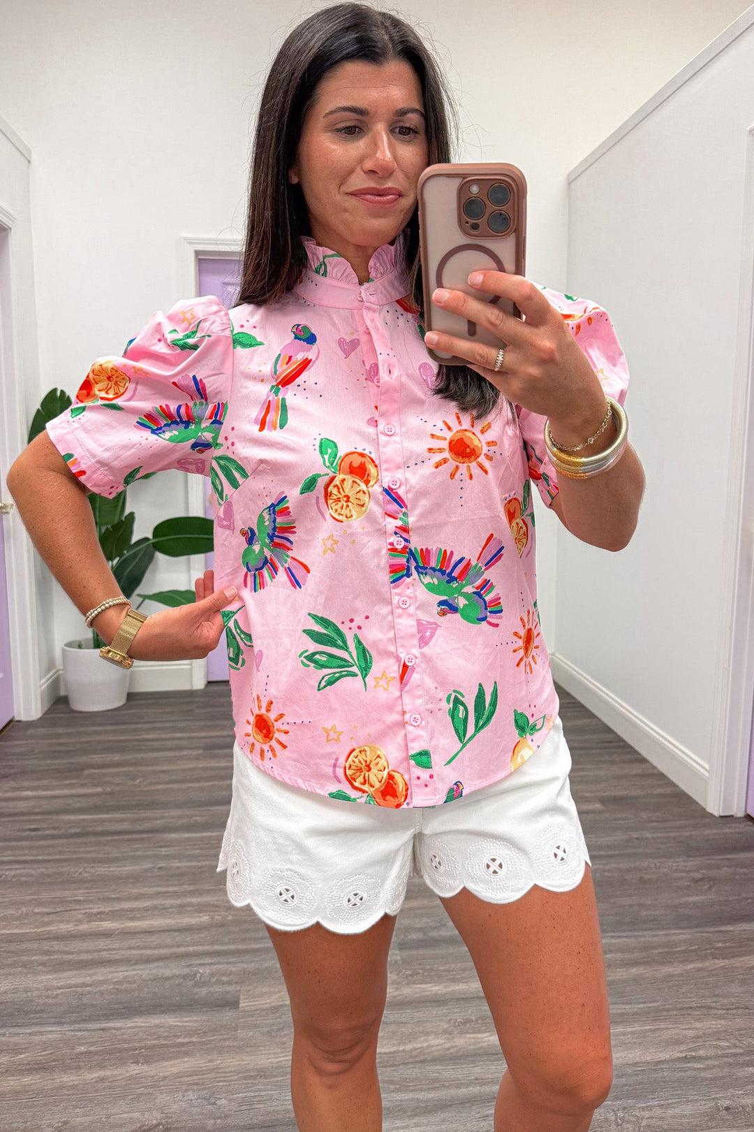 light pink with tropical themed print button down short sleeve relaxed fit top