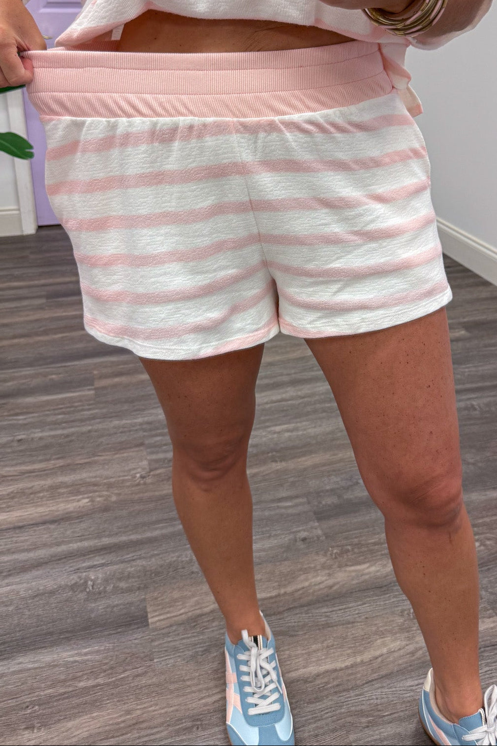pink and white striped elastic waistband lightweight knit shorts