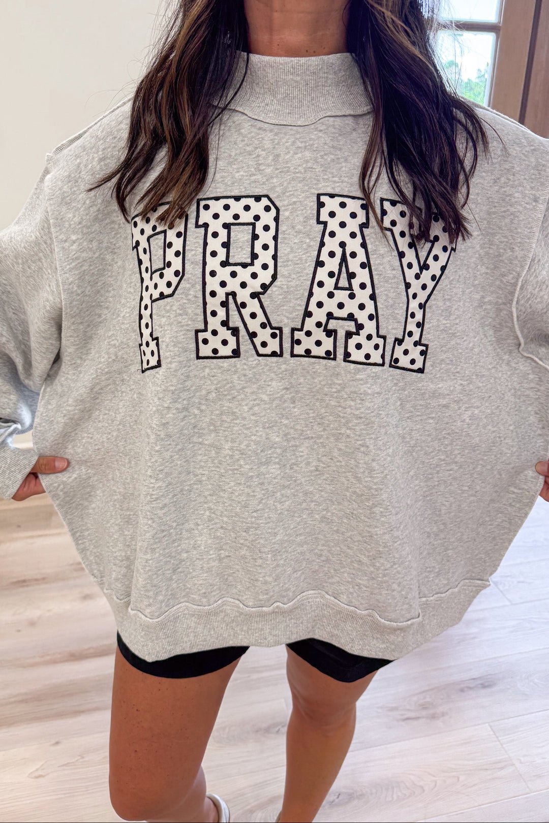 black and white polka dot patch letter oversized mock neck pullover