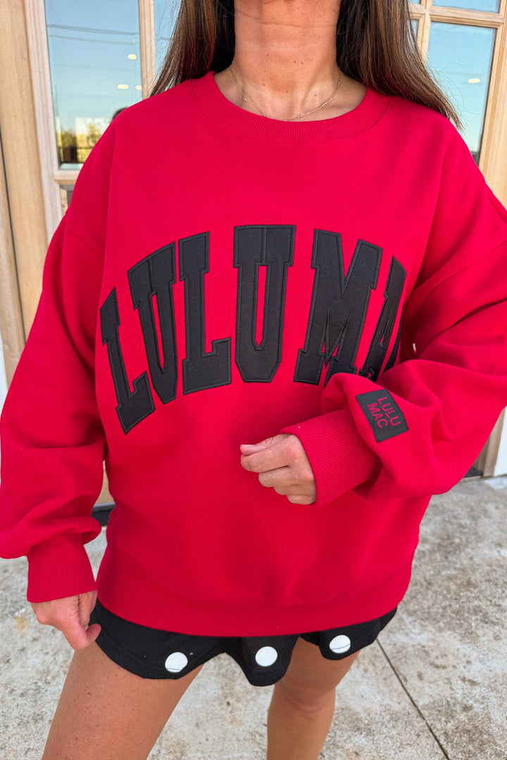 red with black embroidered lulu mac long sleeve ribbed crew neckline sweatshirt