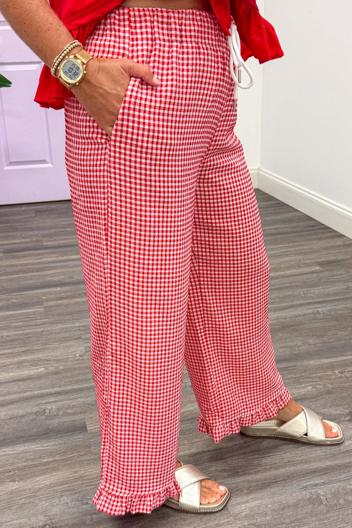 red and cream gingham checkered print ruffle hem textured wide leg pants with front pockets