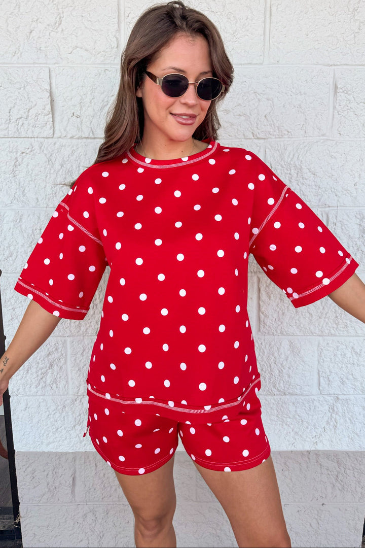 red with white polka dot print drop shoulder short sleeve top and shorts matching knit athleisure set