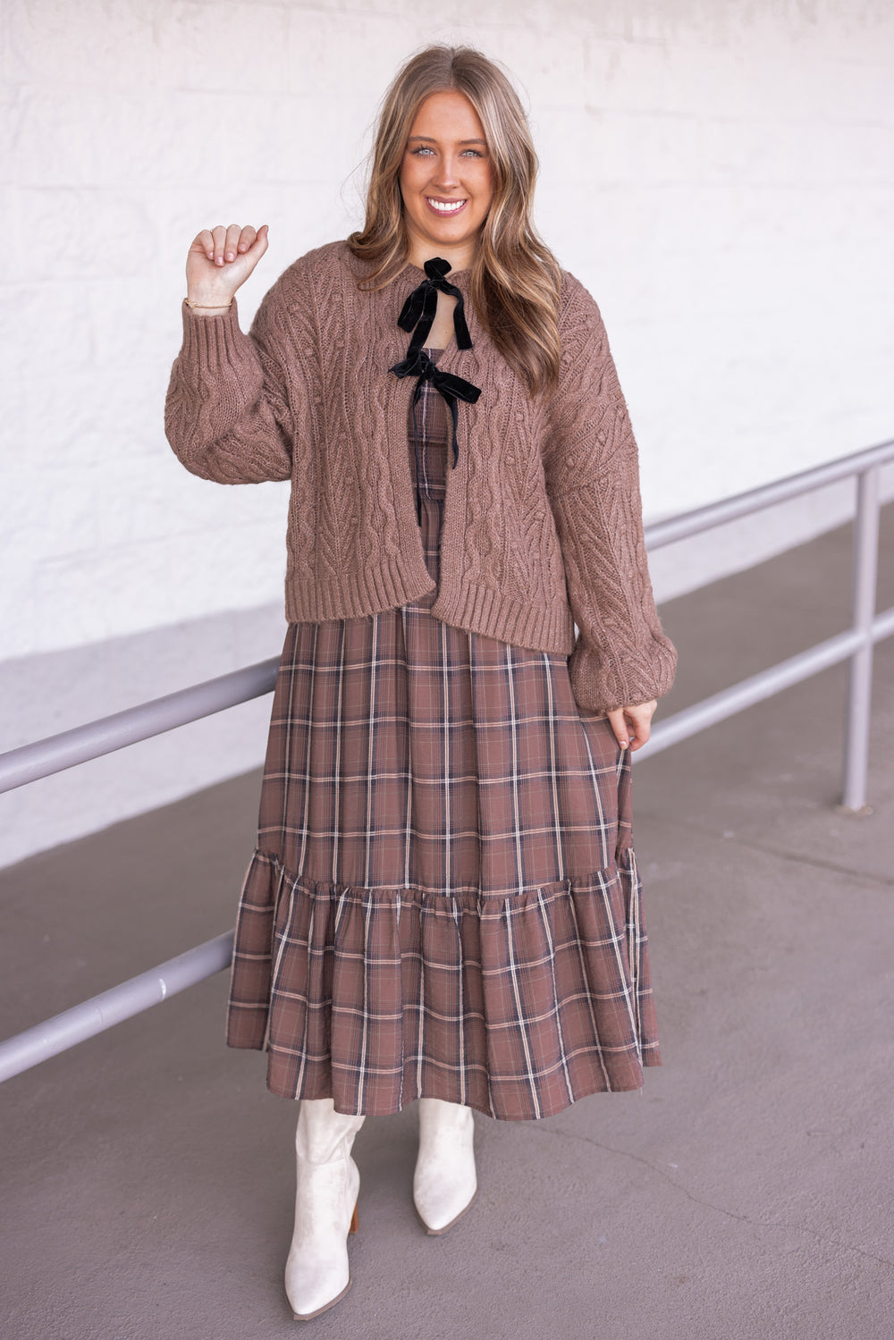 Women's mocha brown cable knit sweater cardigan with black bow tie closure by Blu Pepper showing full front view