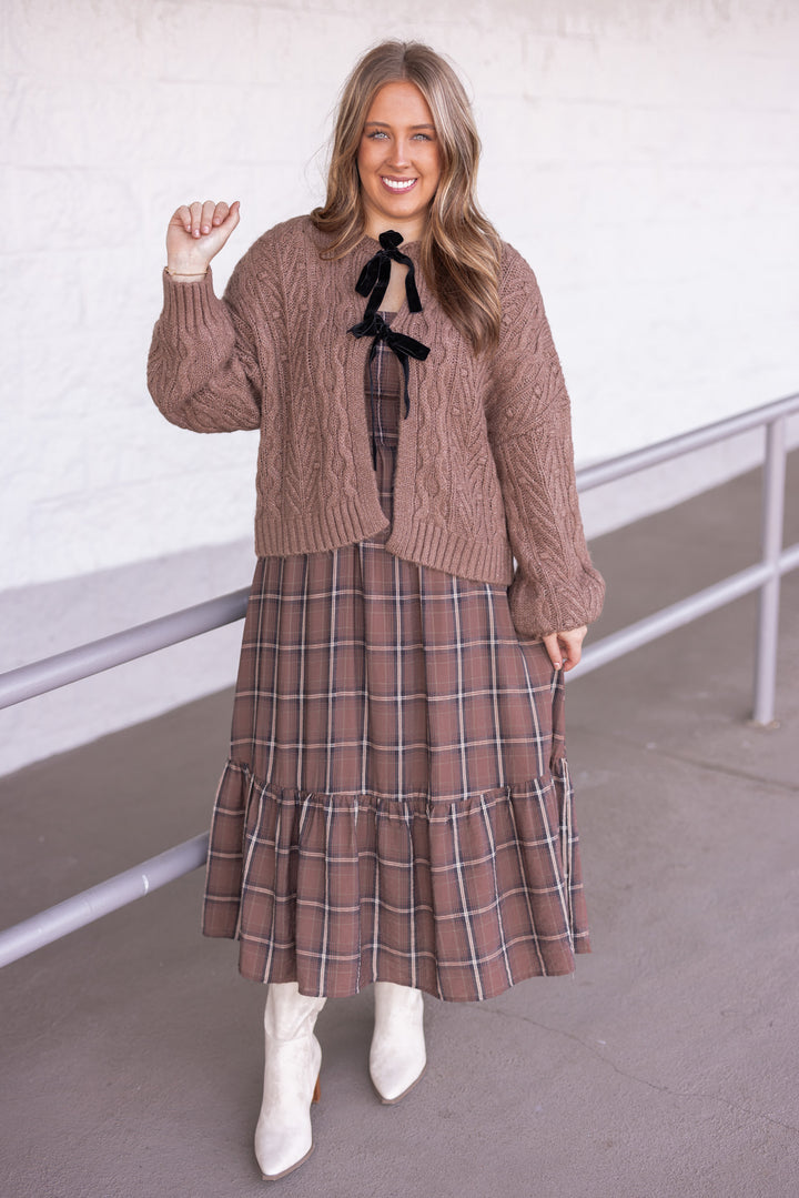 Women's mocha brown cable knit sweater cardigan with black bow tie closure by Blu Pepper showing full front view