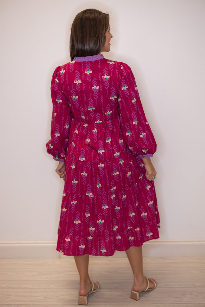 Women's magenta pink floral print tiered midi dress with button front bodice by Jodifl showing full back view