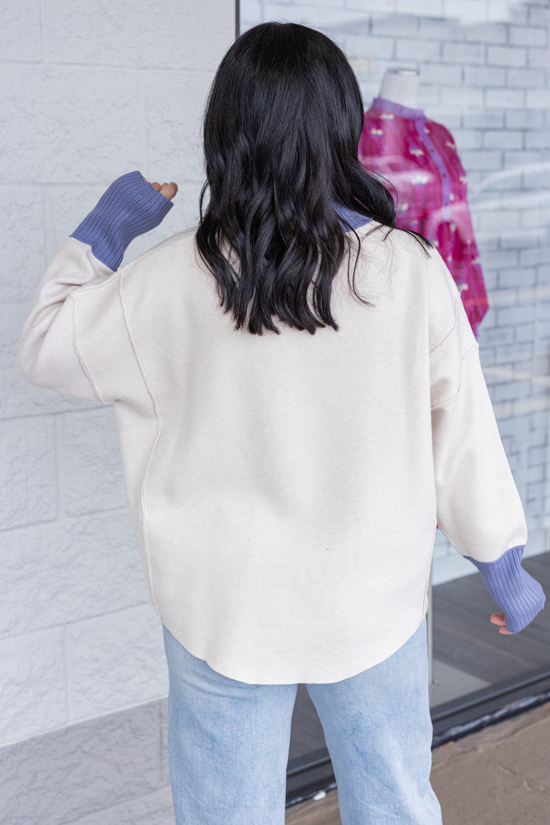 Women's ecru sweater knit pullover top with cornflower blue ribbed trim by Entro showing up close back view