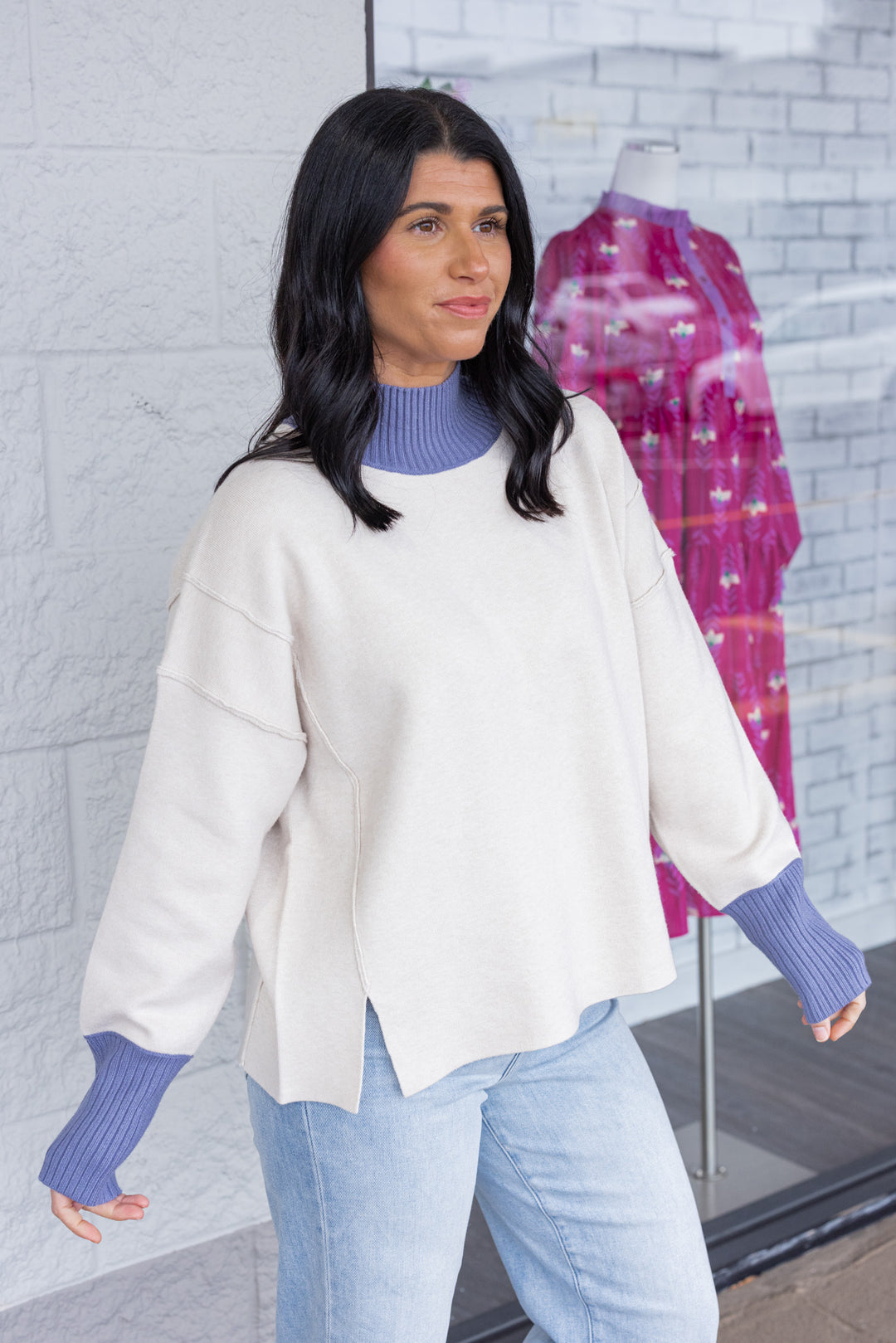 Women's ecru sweater knit pullover top with cornflower blue ribbed trim by Entro showing up close side view