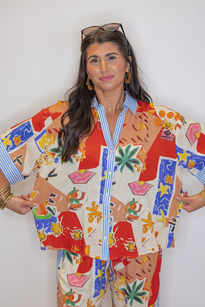 tropical resort printed button up top