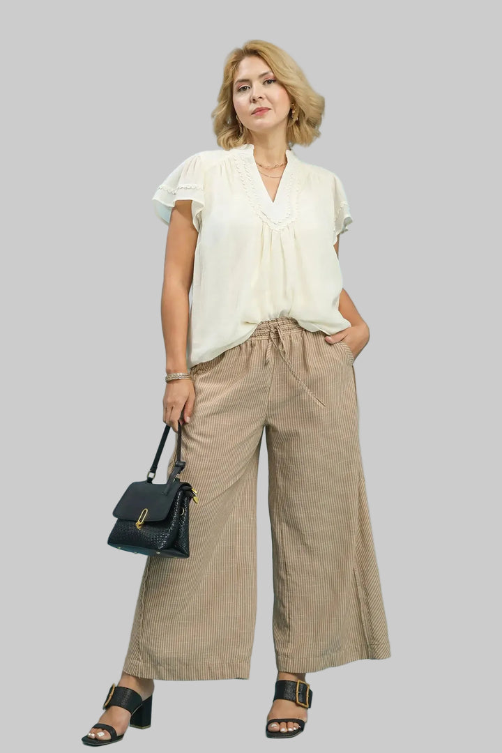 Umgee plus size tan and cream striped wide leg linen pants with frayed seam details