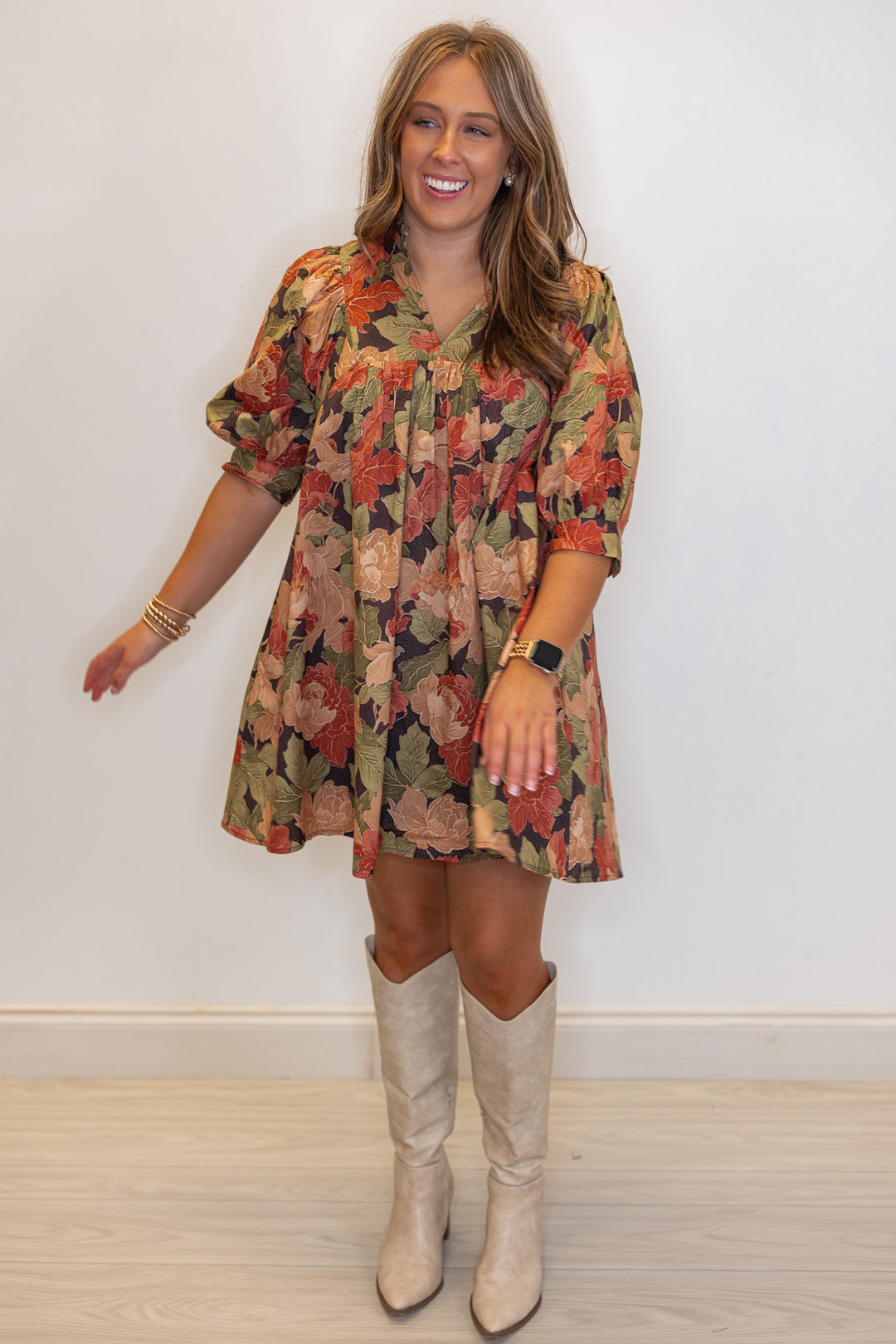 Women's trendy brown babydoll dress with rusted burgundy, dusty peach and olive floral print by Entro, perfect for fall