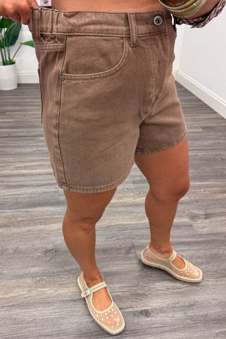 washed chocolate brown button fly closure wide leg denim shorts with elastic waistband in back