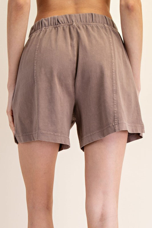 Women's elastic waist knit shorts in mineral washed mocha brown by Rae Mode showing back view