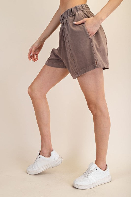 Women's elastic waist knit shorts in mineral washed mocha brown by Rae Mode showing side view