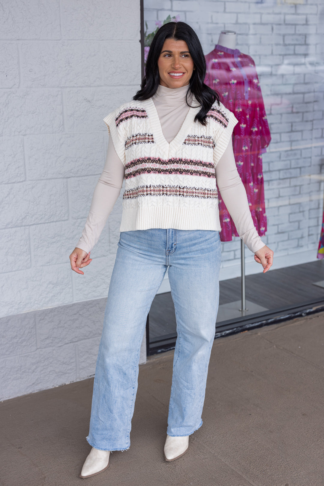 Women's ivory cable knit sweater vest style top with brown and pink stripes by idem ditto showing full front view