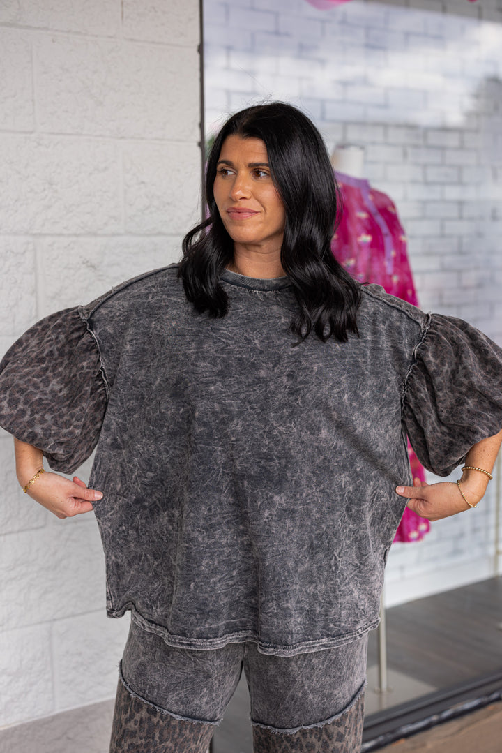 Women's mineral washed ash black knit top with animal print colorblock details by J Her showing true to size fit