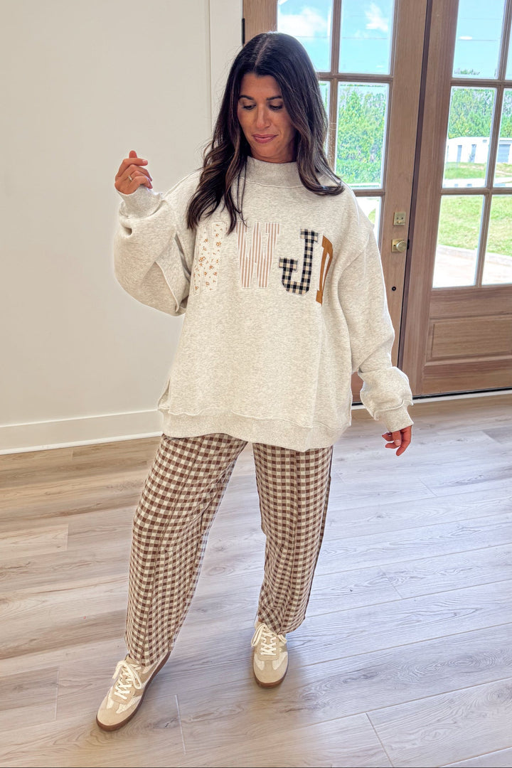 wwjd oversized mock neck pullover with brown gingham pants
