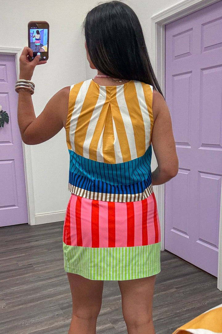 yellow blue teal brown and cream striped button front semi-cropped top with back pleated detail
