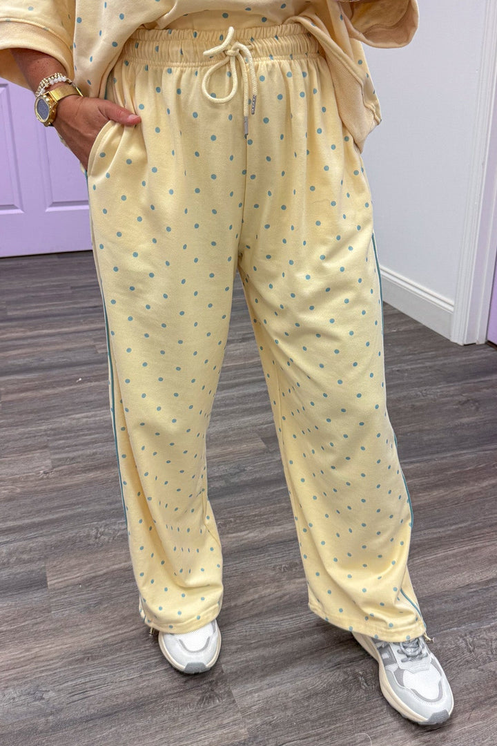 washed butter yellow with light blue polka dots drawstring wide leg knit jogger pants