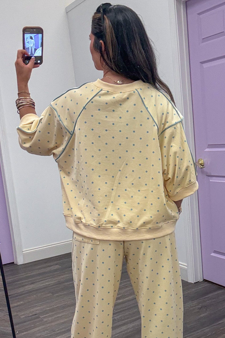 washed butter yellow with light blue polka dots short sleeve terry knit top with piping details
