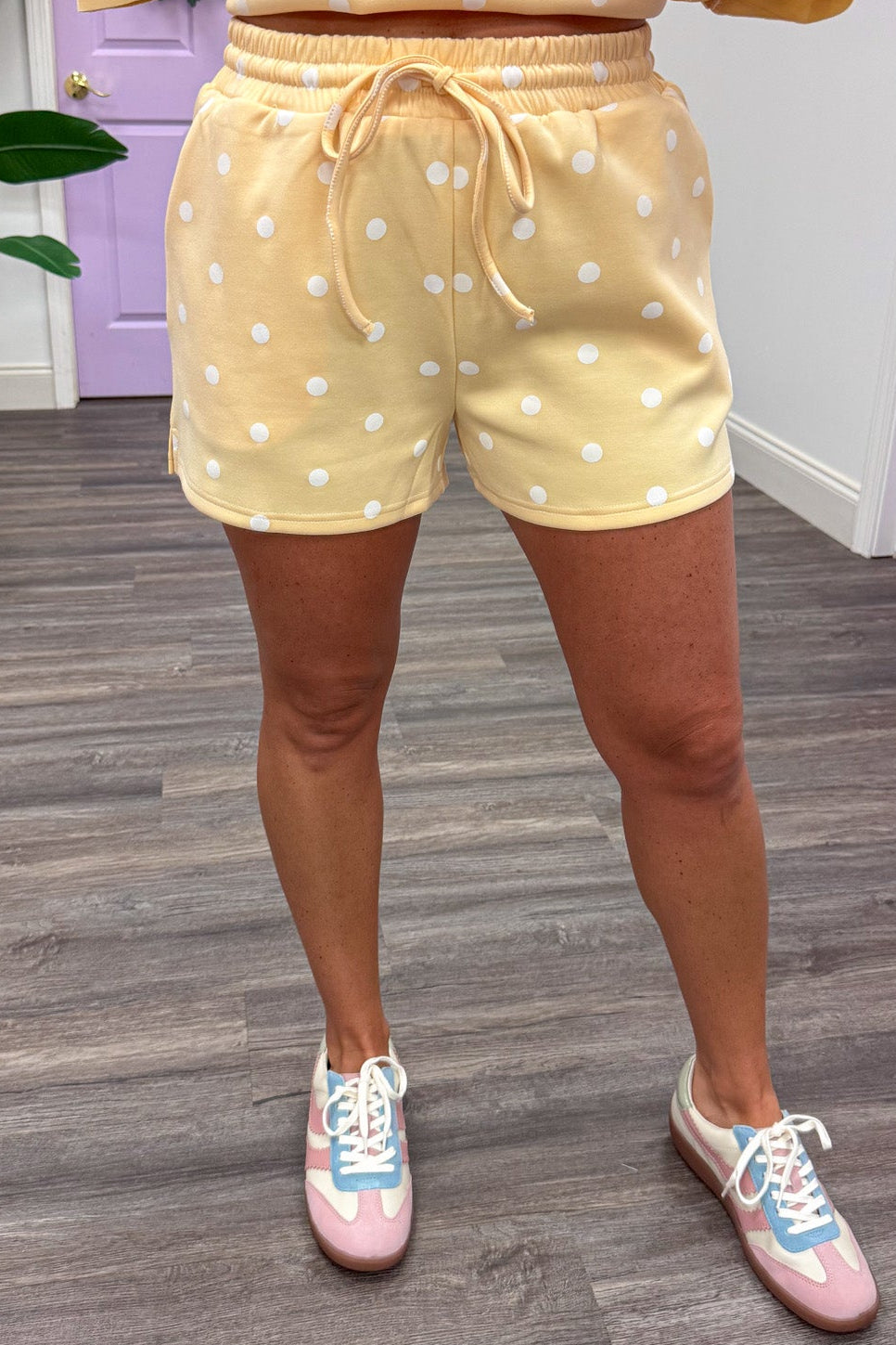 butter yellow with white polka dot print top and drawstring shorts matching knit loungewear set