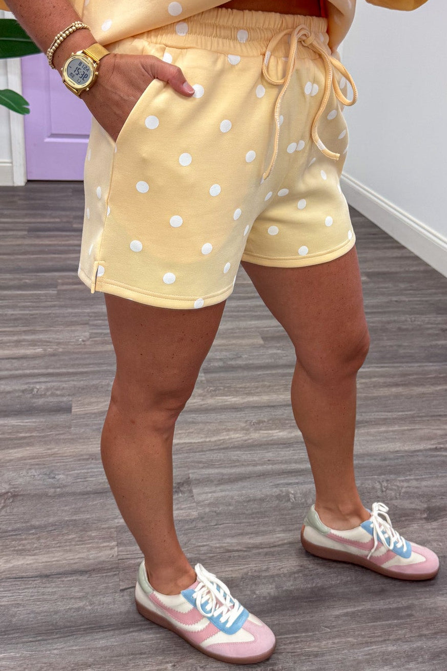 butter yellow with white polka dot print top and front pocket shorts matching knit loungewear set